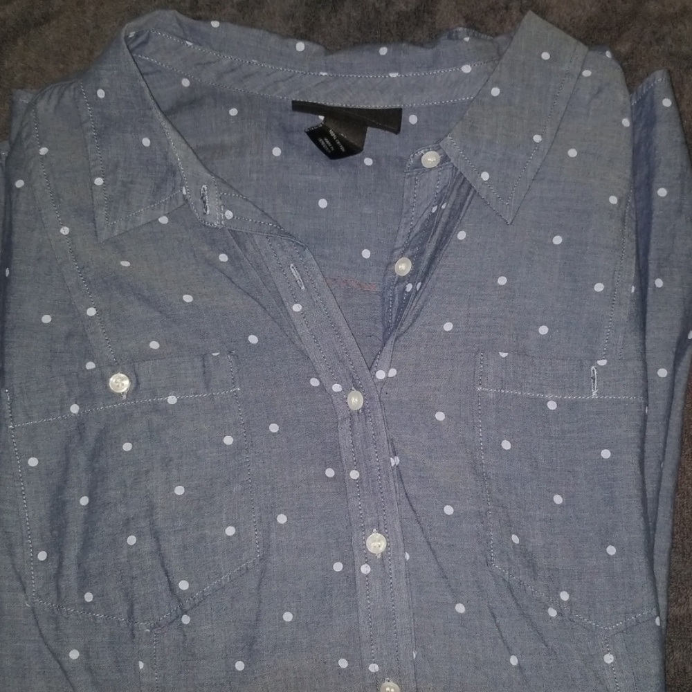 Lightweight long sleeve button down blouse.